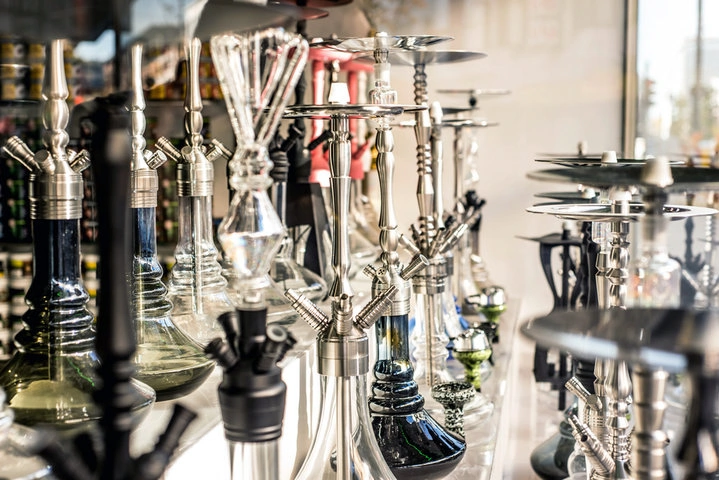 Colorful glass pipes in different shapes and styles displayed at a North Miami smoke shop