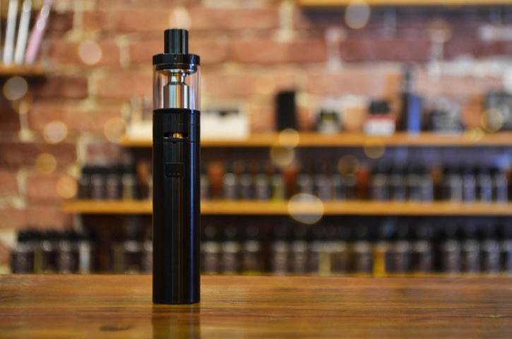 Affordable and premium vape accessories arranged on a retail display in North Miami