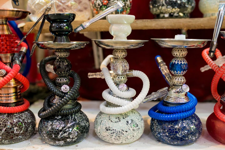 Beginner starter kits and complete hookah sets arranged inside a North Miami hookah shop