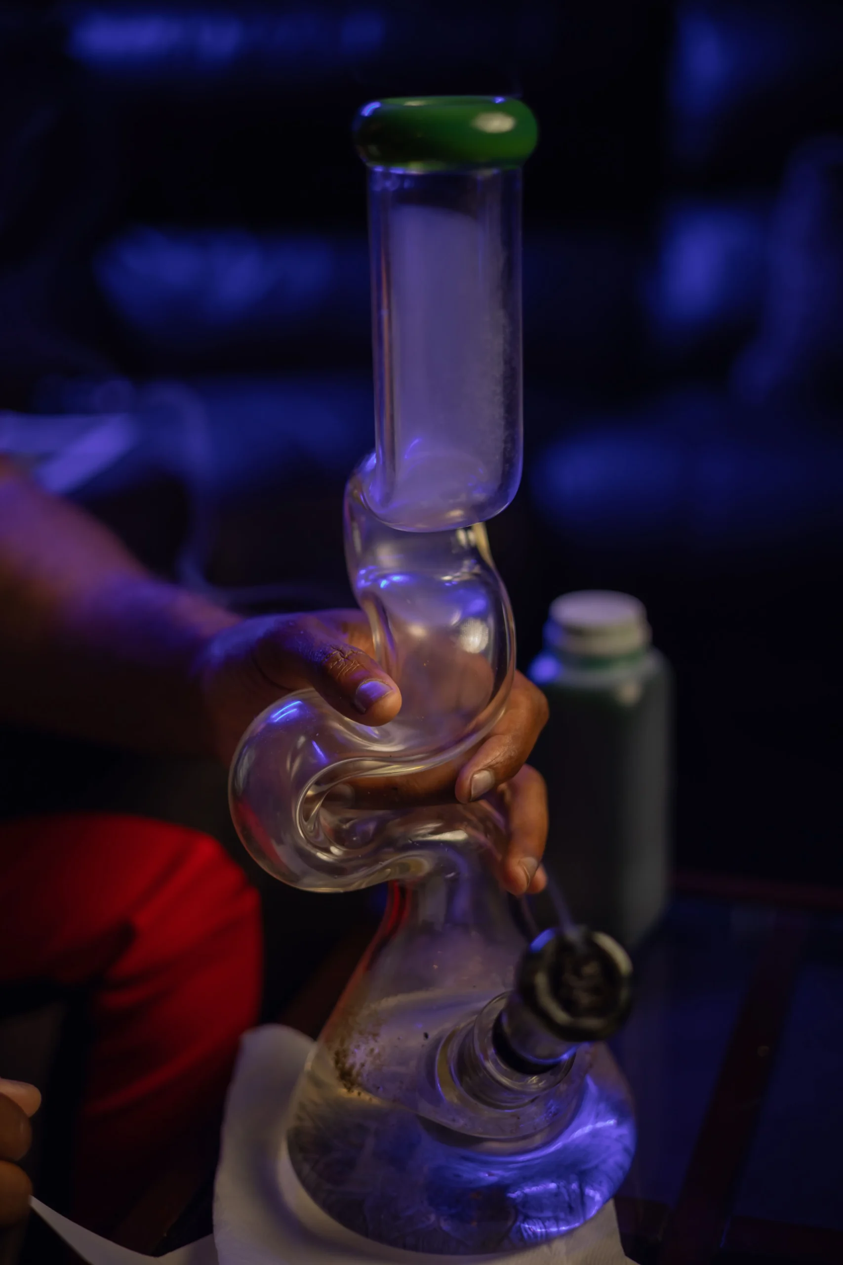 Minimalist straight tube glass water pipe displayed at a North Miami smoke shop